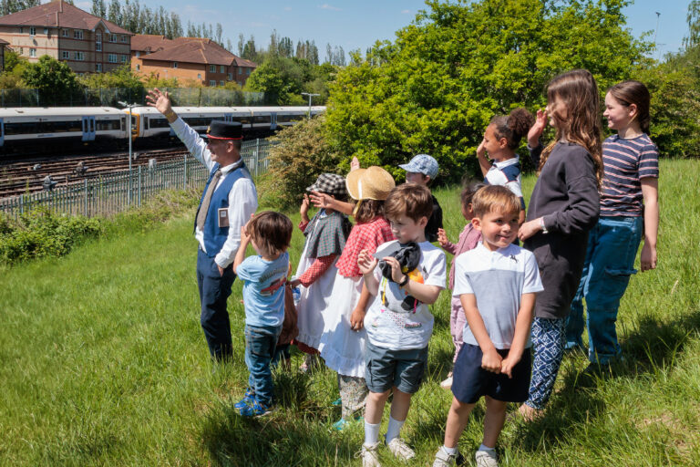 Southeastern celebrates Rail 200 with a Railway Children themed event at Grove Park station. Grove Park is the home of The Railway Children, author E Nesbit lived in the area.
Peter Jenkinson and the children wave to a train.
Grove Park Station, Baring Road, Grove Park, London. SE12 0DZ
Picture: Andy Jones/Southeastern